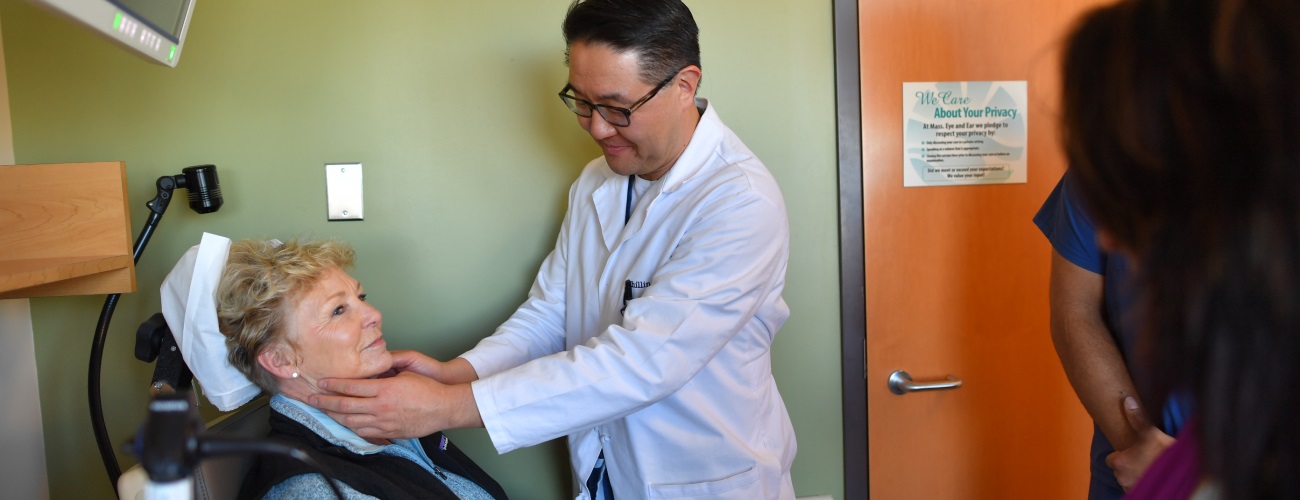 Mass. Eye and Ear physician examines a patient in room