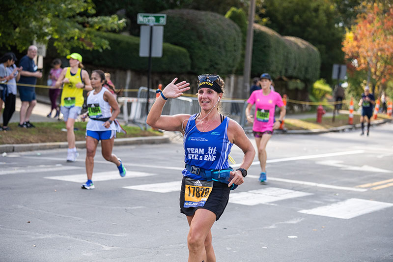 Member of Team Eye and Ear running at Boston Marathon